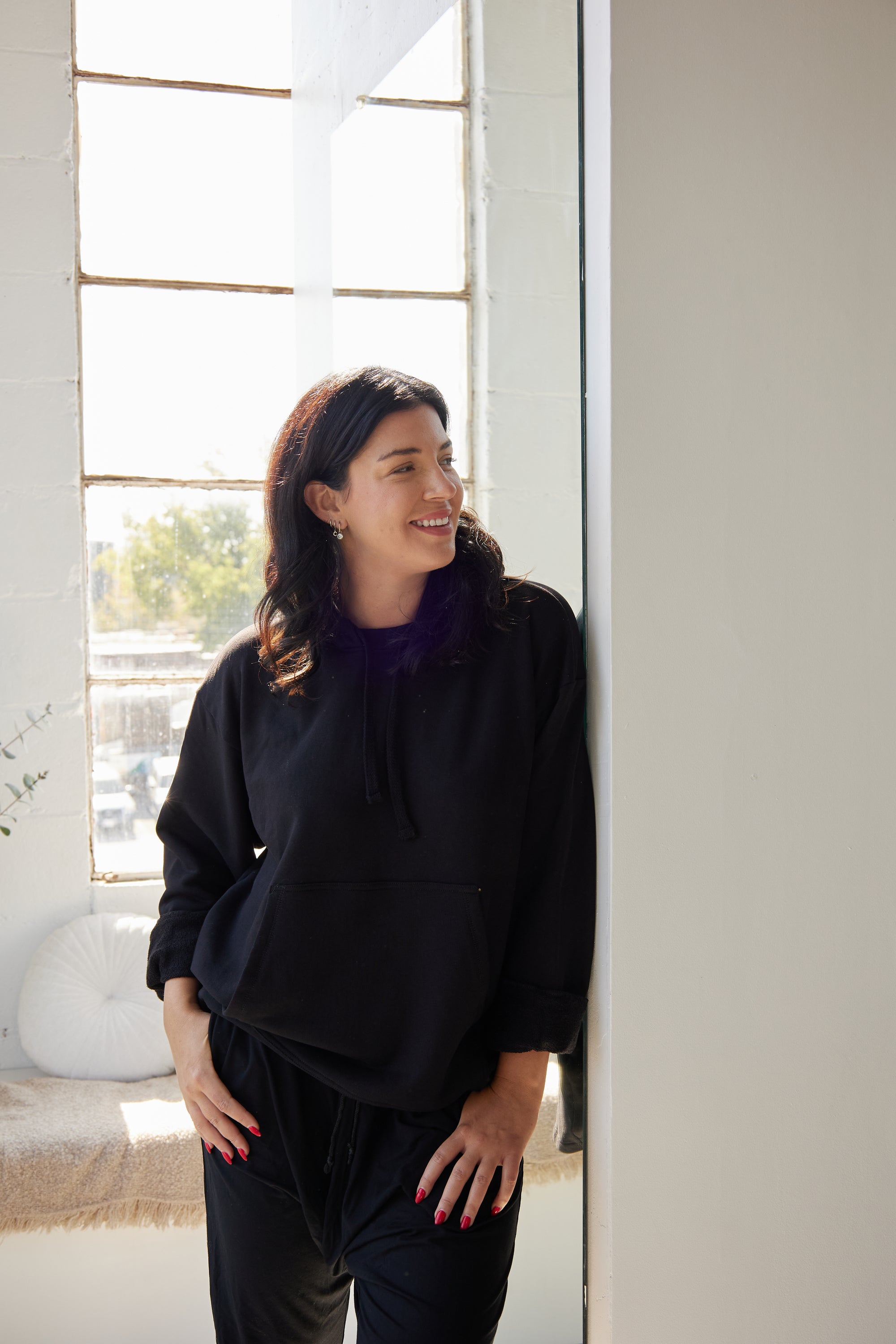 The Black Hoodie by Cassandra Elizabeth is an ethically made, minimalist wardrobe essential, and is the epitome of quiet luxury.