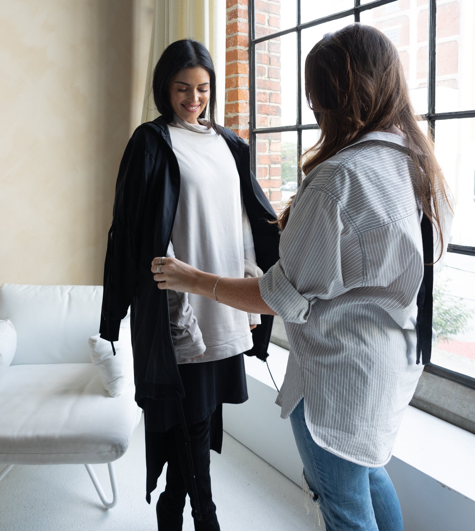 Cassandra Elizabeth, Toronto-based image consultant and clothing stylist, helping a client build a personalized, minimal wardrobe with quiet luxury pieces.
