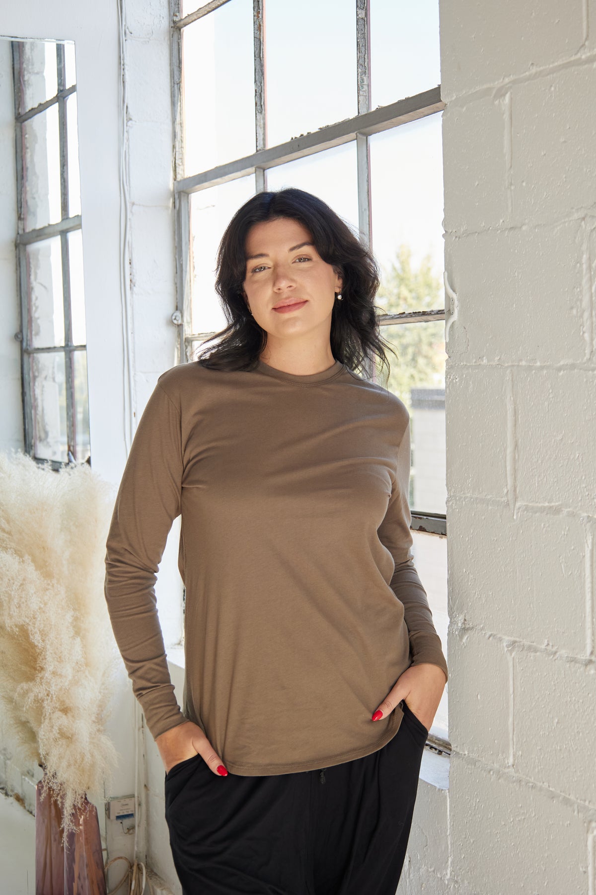 The Cotton Long Sleeve - Olive by Cassandra Elizabeth is an ethically made, minimalist wardrobe essential, and is the epitome of quiet luxury. 