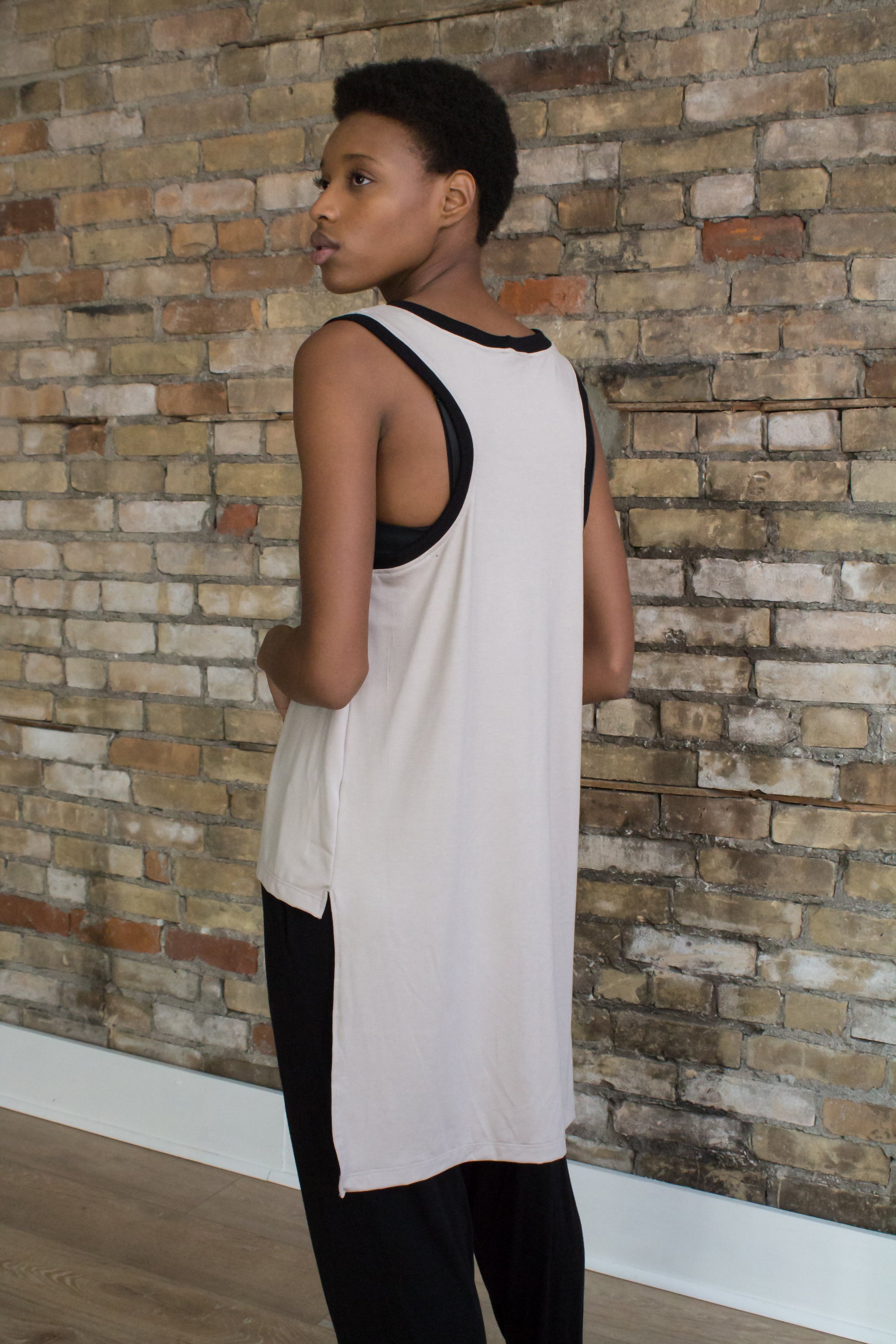The Almond Trinity Tank by Cassandra Elizabeth is an ethically made, minimalist wardrobe essential, and is the epitome of quiet luxury.