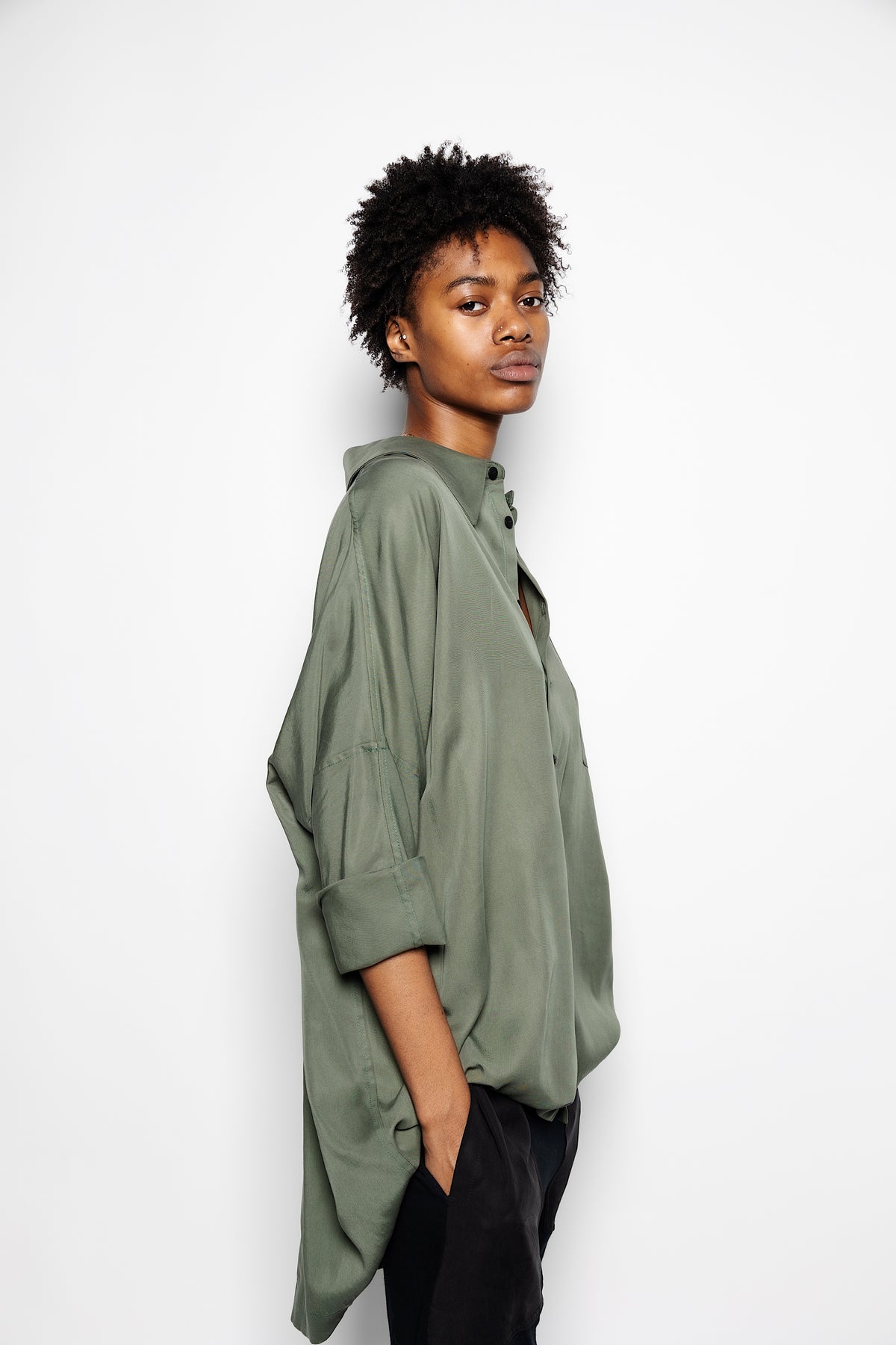 The Button Down - Olive by Cassandra Elizabeth is an ethically made, minimalist wardrobe essential, and is the epitome of quiet luxury.